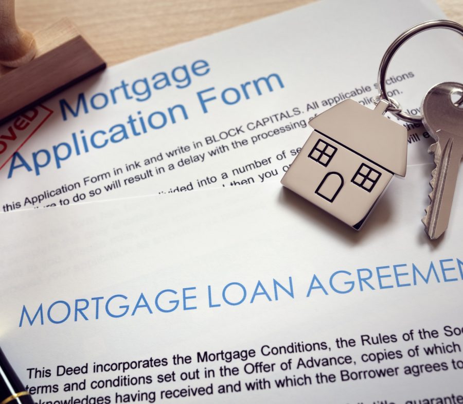 Mortgage application loan agreement and house key